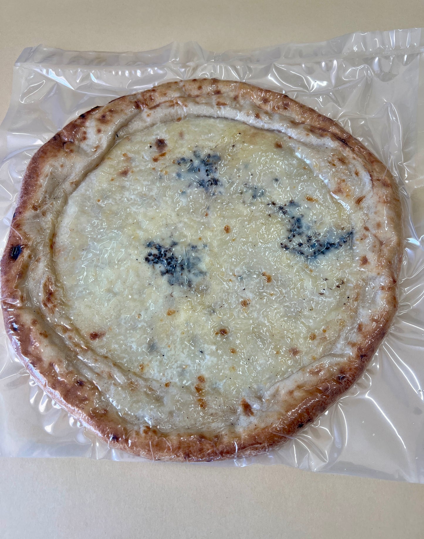 pre-baked Cheese and Truffle Pizza