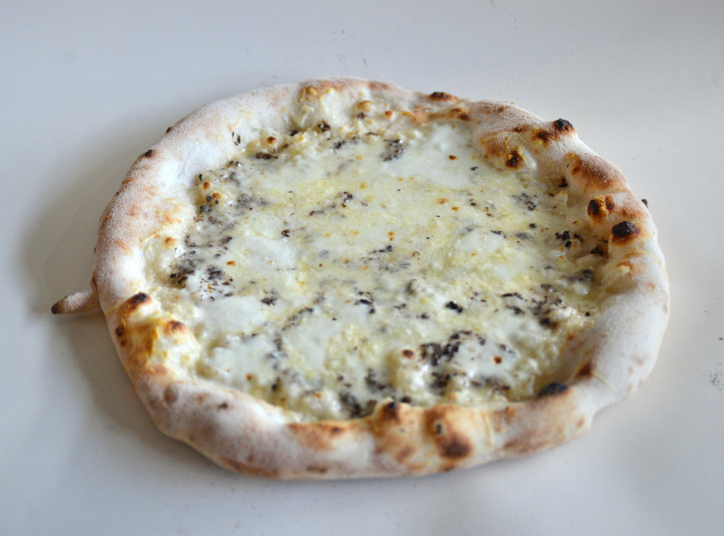 pre-baked Cheese and Truffle Pizza