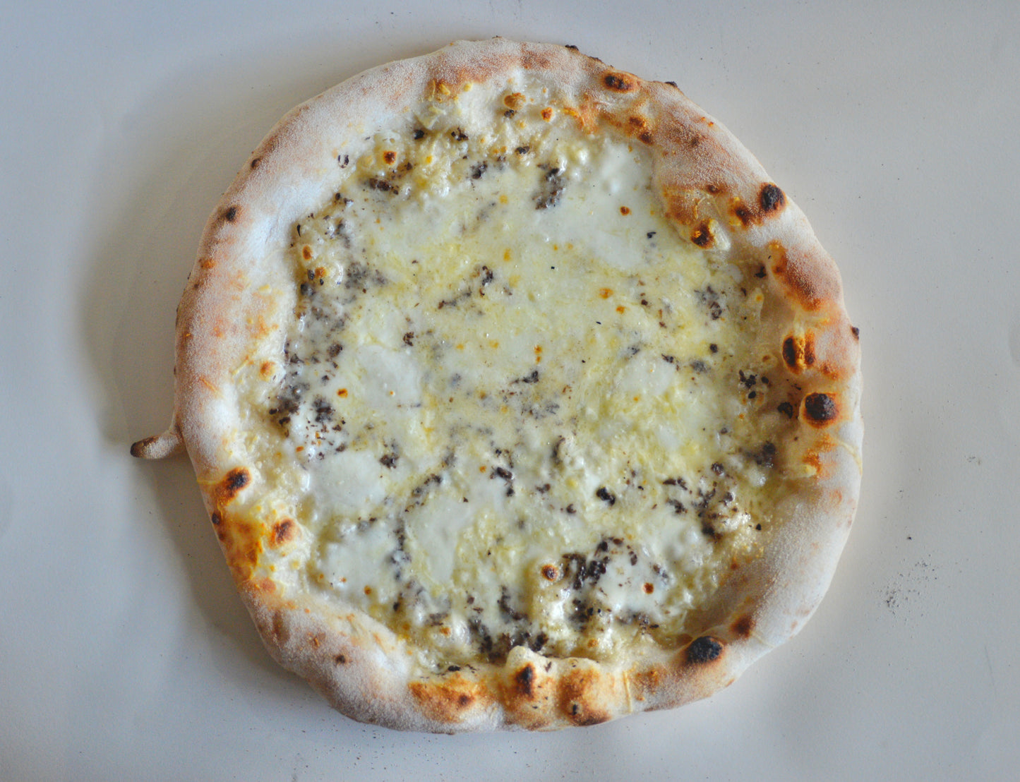 pre-baked Cheese and Truffle Pizza
